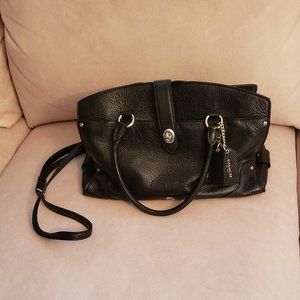 Coach Cross body leather. Great bag but I have downsized.